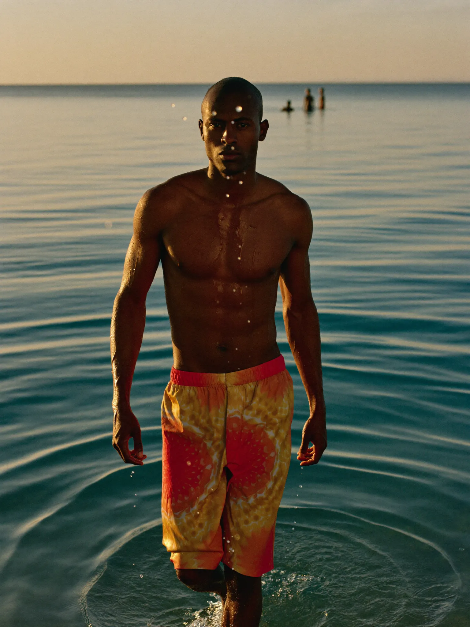 IceZone swim shorts photographed at golden hour by the sea